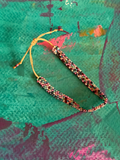 Pulsera Sara pastel dorado