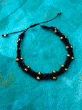 PULSERA NEGRA